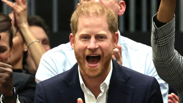 Prince Harry cheering amongst crowd