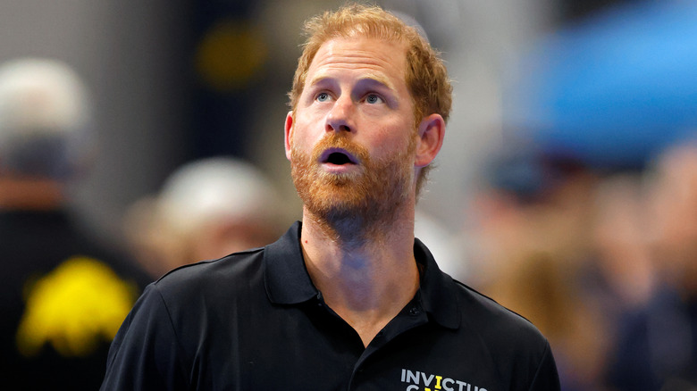 Prince Harry black collared shirt