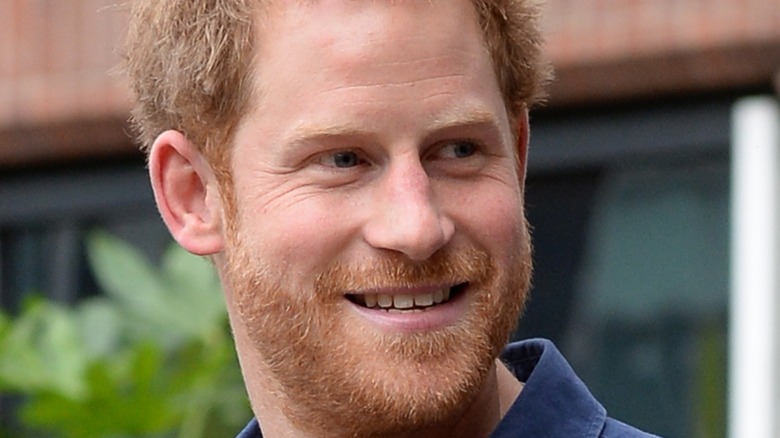 Prince Harry waving to onlookers