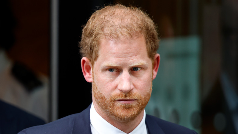 Prince Harry frowning