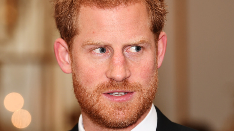 Prince Harry wears a tux at an event 