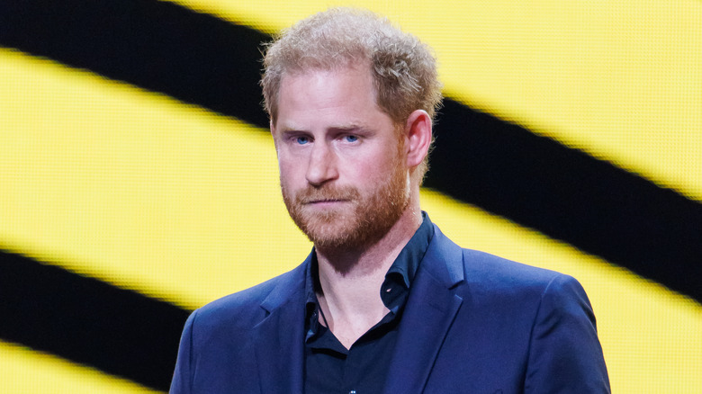 Prince Harry looking somber