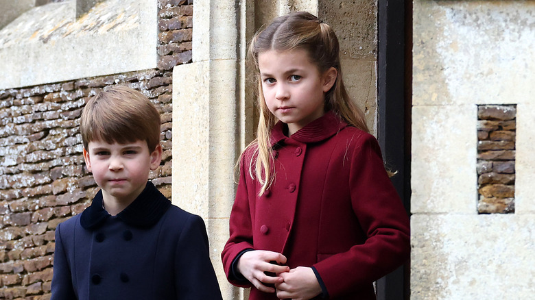 Prince Louis in a blue coat