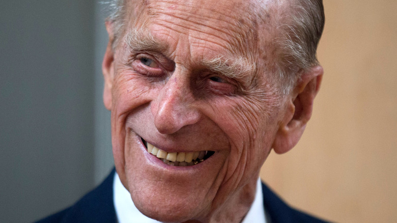 Prince Philip smiling head tilted