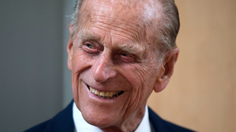 Prince Philip smiling head tilted