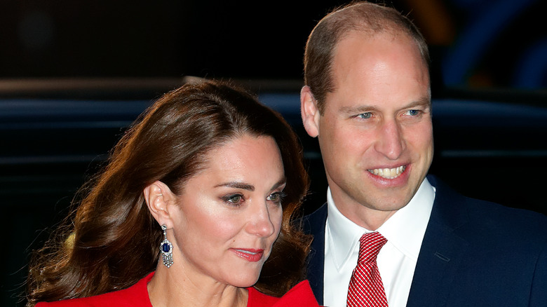 Prince William and Kate Middleton looking to the side