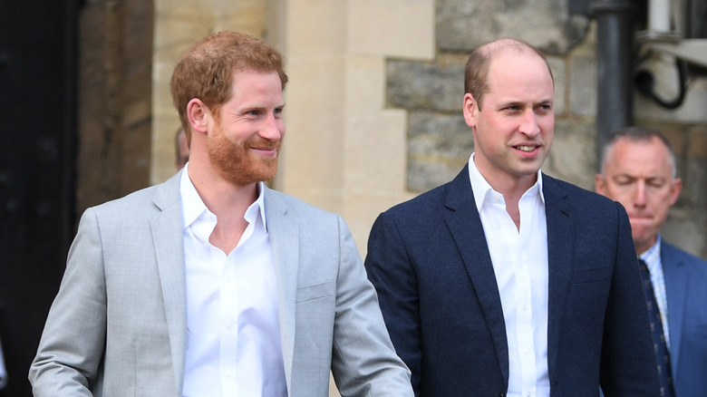 Prince Harry and Prince William walking and smiling