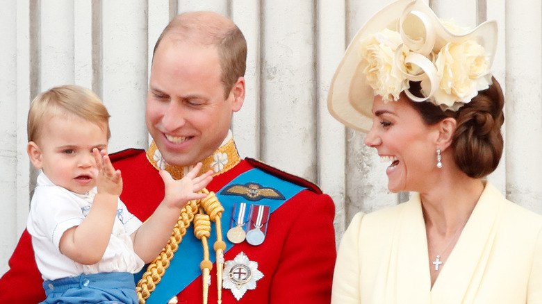 Prince William and Kate Middleton with Prince Louis