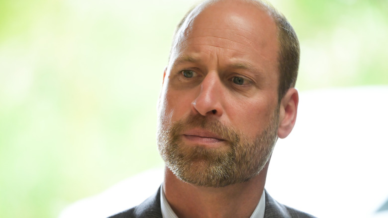 Prince William frowning