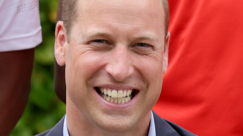 Prince William smiling at an event