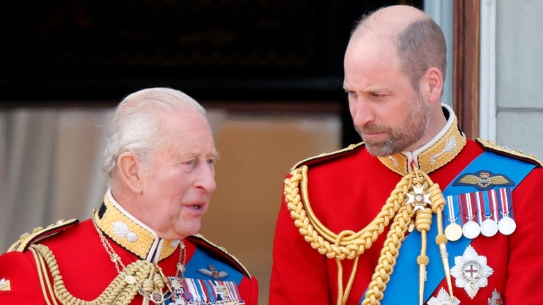King Charles III talking to Prince William