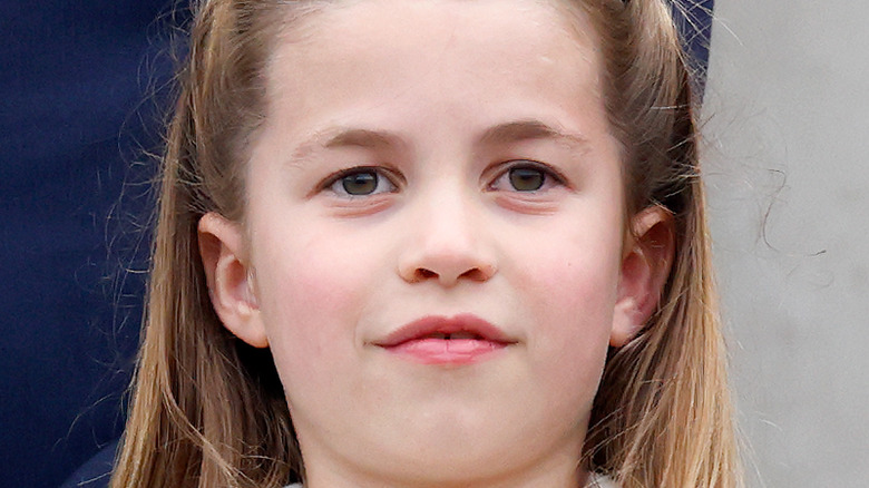 Princess Charlotte standing on the balcony of Buckingham Palace 