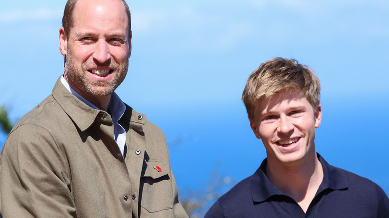 Prince William and Robert Irwin smiling outside