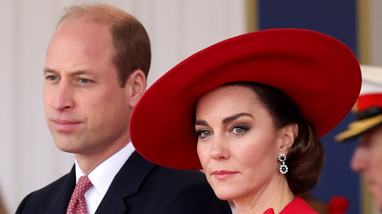 Prince william and kate middleton frowning