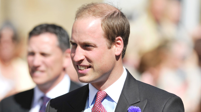 Prince William smiling at a wedding (2013)