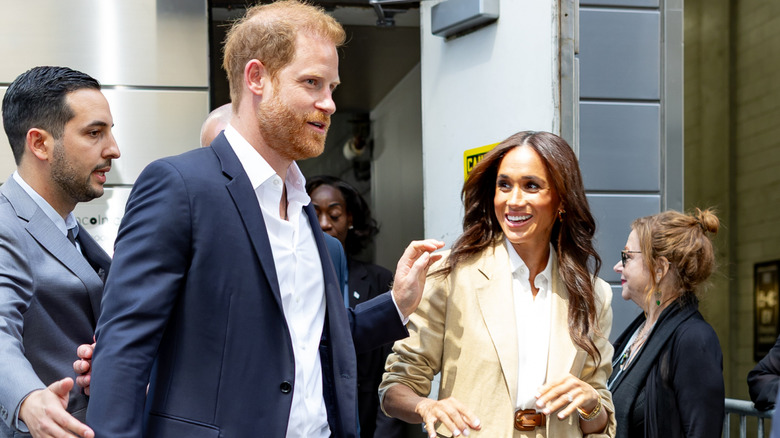 Prince Harry and Meghan Markle walk together