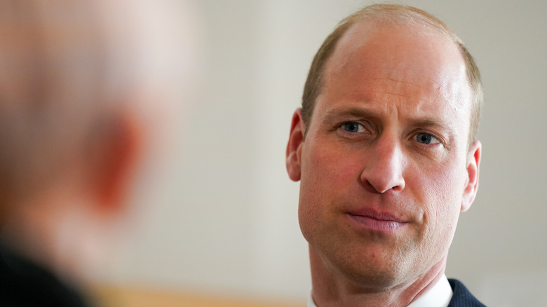 Prince William frowning