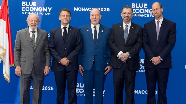 Prince William posing with presidents