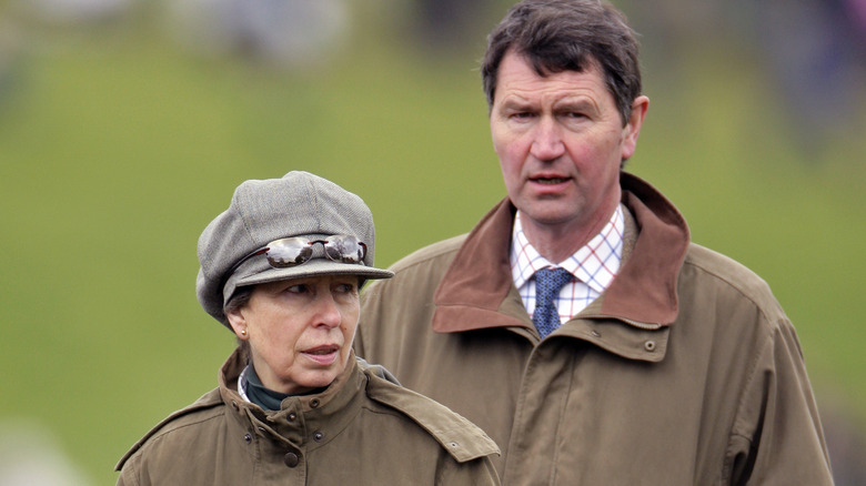 Princess Anne and Sir Timothy Laurence outdoors