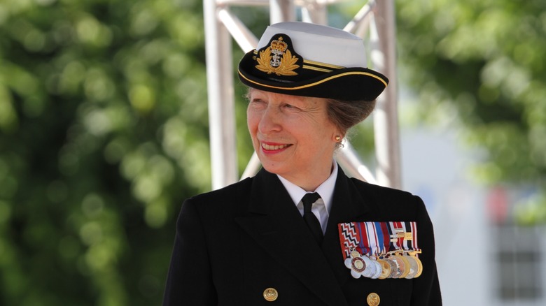 Princess Anne smiling in military uniform