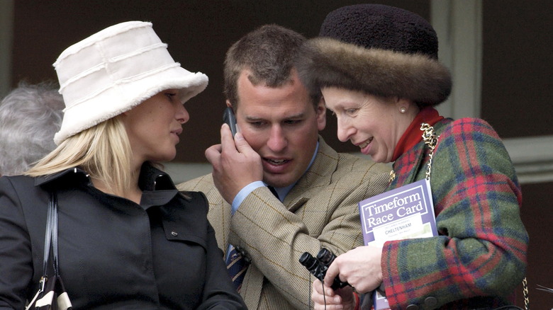 Zara Tindall, Peter Phillips, and Princess Anne chatting