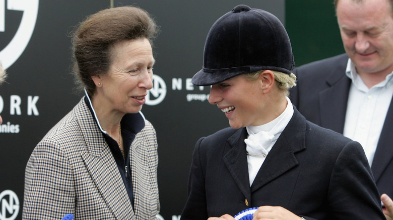 Princess Anne and Zara Tindall celebrate a blue ribbon at the 2006 Gatcombe horse trials