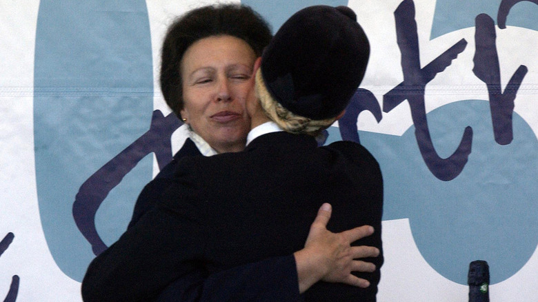 Princess Anne hugging Zara Tindall at the Gatcombe horsetrials in 2005