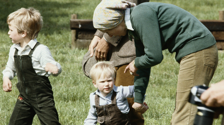 Princess Anne with her two young kids a the 1983 Windsor horse show