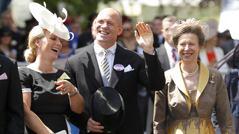 Zara Tindall, Mike Tindall, and Princess Anne laughing at Ascot in 2014
