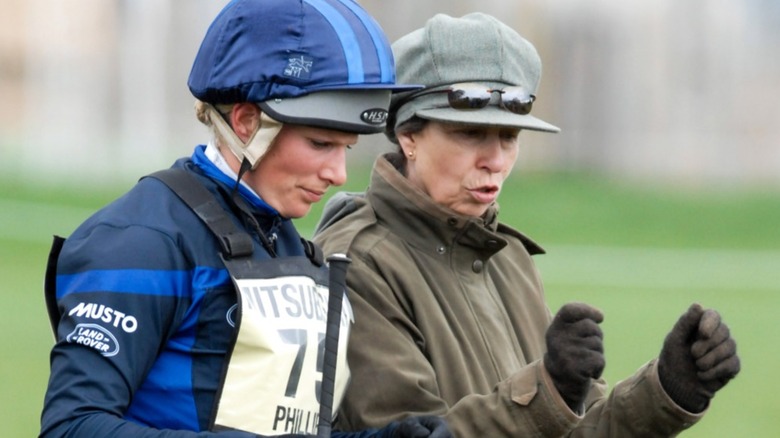 Zara Tindall and Princess Anne walking at the 2010 Badminton horse trials
