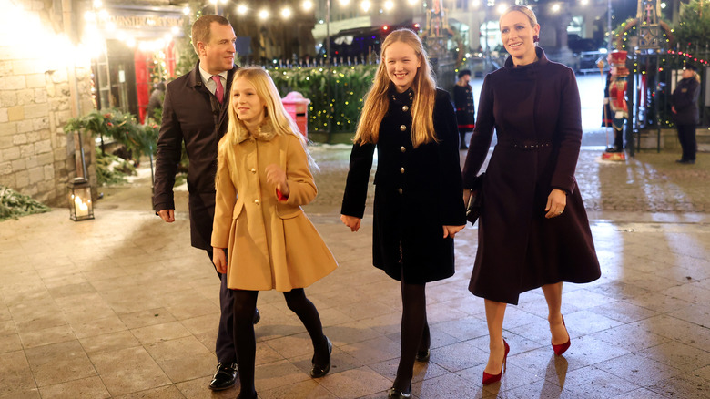 Peter Phillips, Isla Phillips, Savannah Phillips, and Zara Tindall smiling