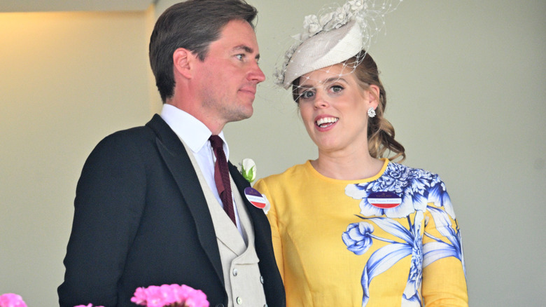 Edoardo Mapelli Mozzi posing with his wife Princess Beatrice in their finery