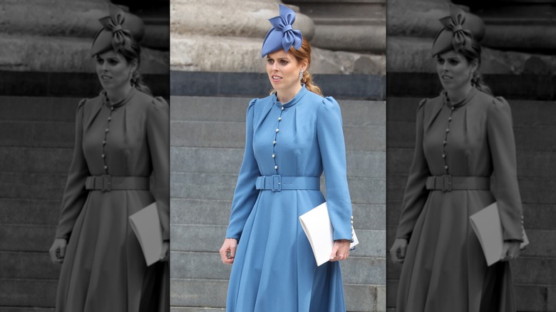 Princess Beatrice walking in a light blue coat dress.