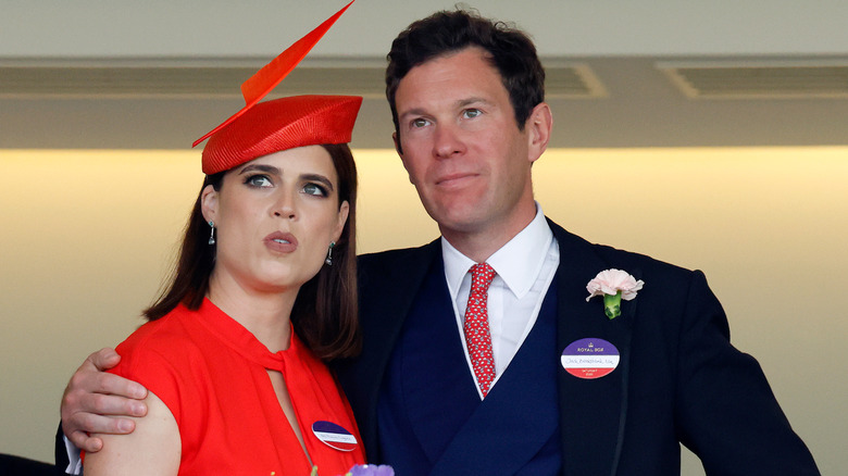 Jack Brooksbank with his arm around Princess Eugenie