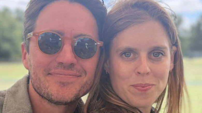Edo Mapelli Mozzi and Princess Beatrice attending a garden event.