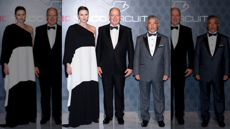 Princess Charlene, Prince Albert, and a guest at the Monaco Grand Prix Gala Dinner