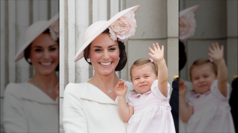Princess Catherine and Princess Charlotte on the Buckingham Palace balcony in pink in 2016