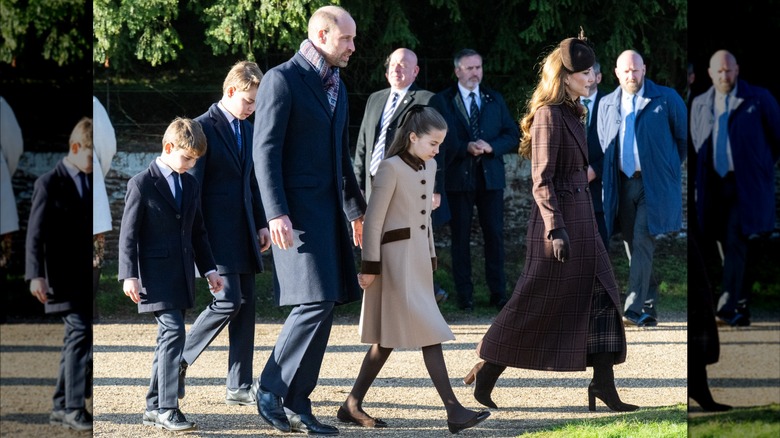 The Wales family in brown and blue tones walking to Christmas morning service on December 25, 2025