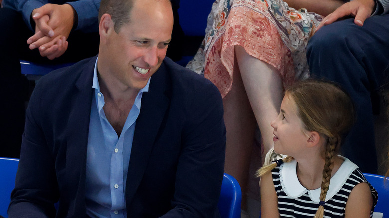 Prince William smiles lovingly at daughter Princess Charlotte