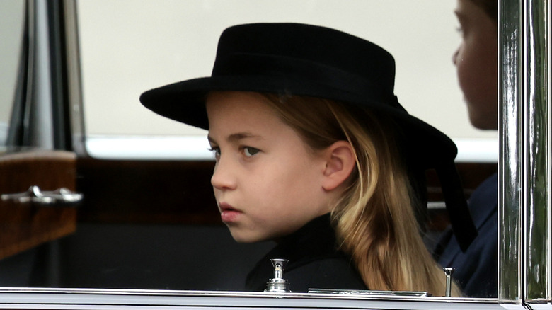 Princess Charlotte in a black hat