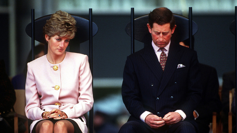 Princess Diana and King Charles III frowning