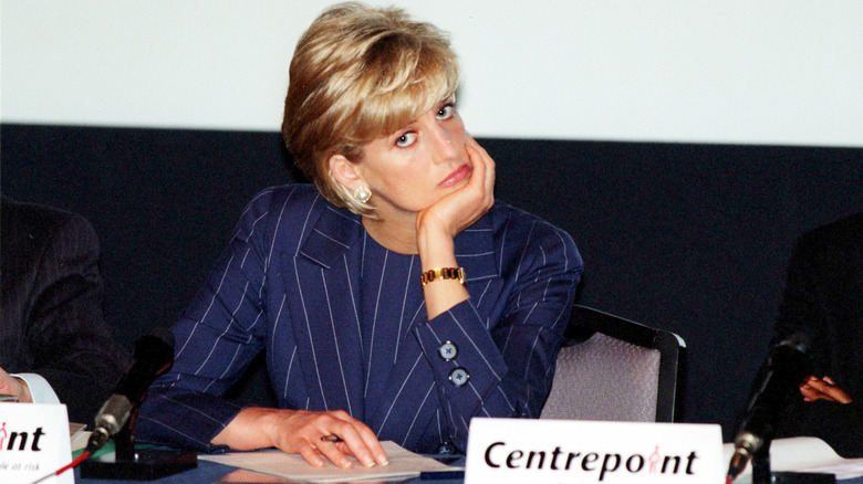 Princess Diana posing for photos