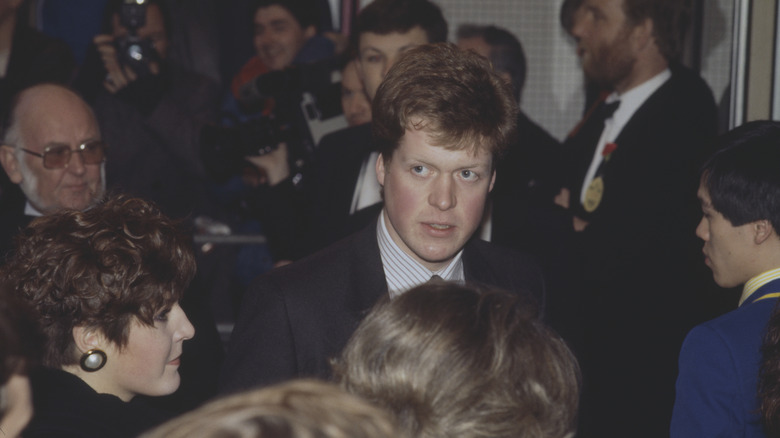 Charles Spencer navigating a crowd.