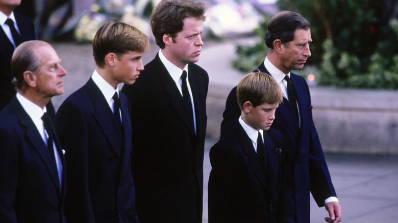 Charles Spencer flanked by King Charles, Prince William, Prince Philip, and Prince Harry attending Princess Diana's funeral.