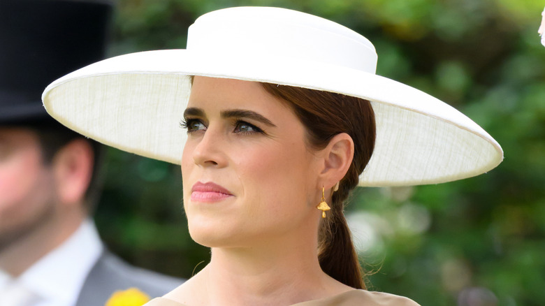 Princess Eugenie close-up in wide-brimmed hat