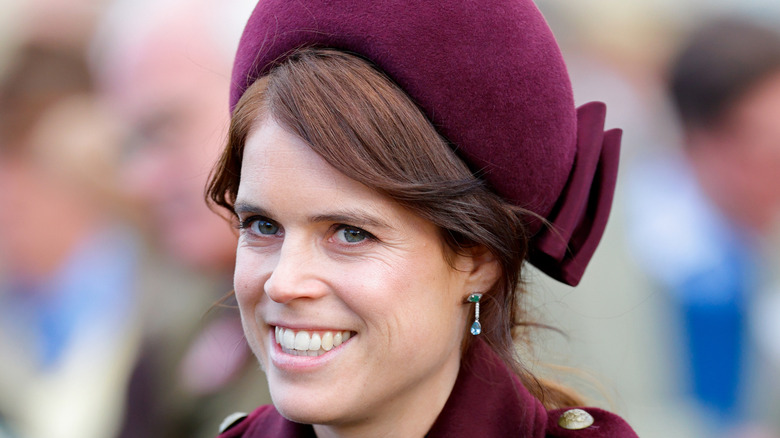 Princess Eugenie smiling at the cameras