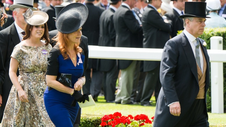Princess Eugenie walking after her parents, Sarah Ferguson and Andrew Mountbatten-Windsor