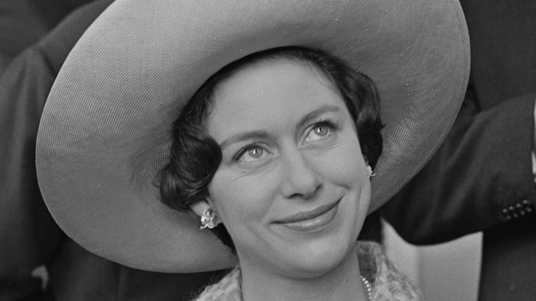 Princess Margaret smiling in big hat