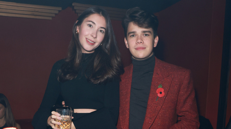 Eleanor Ekserdjian and Samuel Chatto posing at Tatler's Little Black Book Party