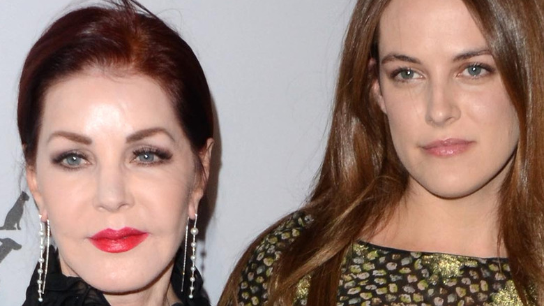 Priscilla Presley and Riley Koeugh with straight faces